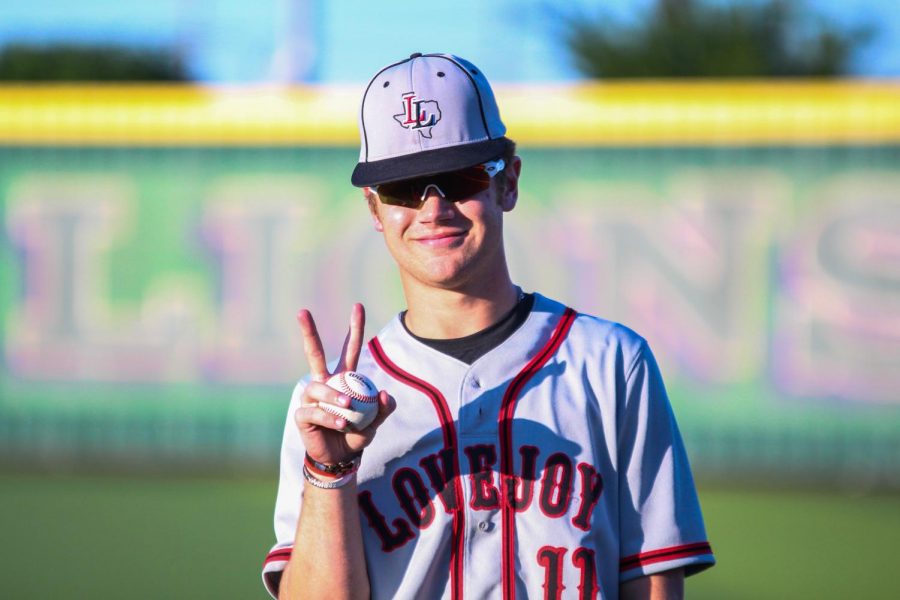 Junior outfielder Ian Warren poses for a photo after the third inning when the Leopards put two runs on the board. The Leopards won the game 4-1.
