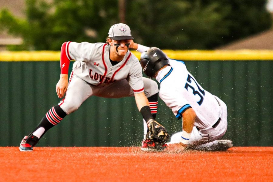 Junior shortstop no. 6 Kolby Branch applies a tag to Rockhill’s center fielder Brenner Cox on a stolen base. Cox was safe to put runners on second and third for Rockhill. 
