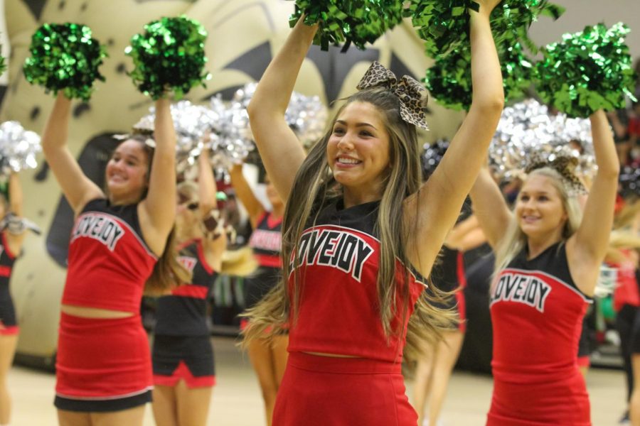 Senior cheer captain Ainsley Abernathy cheers to the fight song. Abernathy is one of the three captains with seniors Chaney Roberts and Viviana Yerkes.