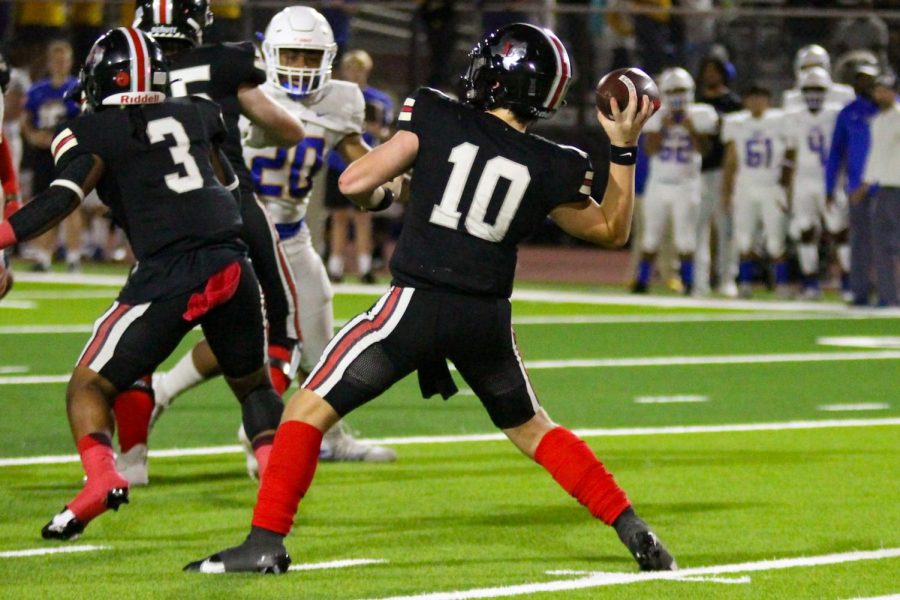 Sophomore quarterback no. 10 Alexander Franklin sets up to throw the ball down the field. The Leopards scored five touchdowns against Frisco.