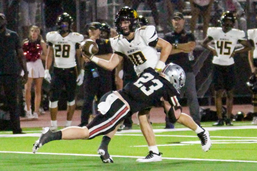 Senior linebacker no. 23 Dillon Magee tackles Memorials no. 10 Braeden Mussett in the second quarter. The Leopards scored three touchdowns in the second quarter of the game.
