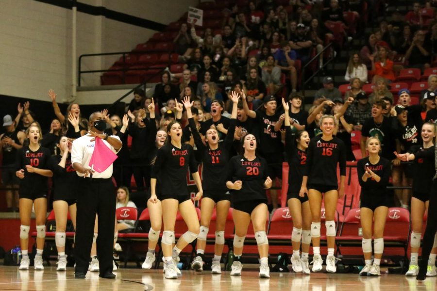 The volleyball team celebrates a kill from sophomore hitter no. 12 Hannah Gonzalez. The team will play the Denison Yellowjackets for their next game.