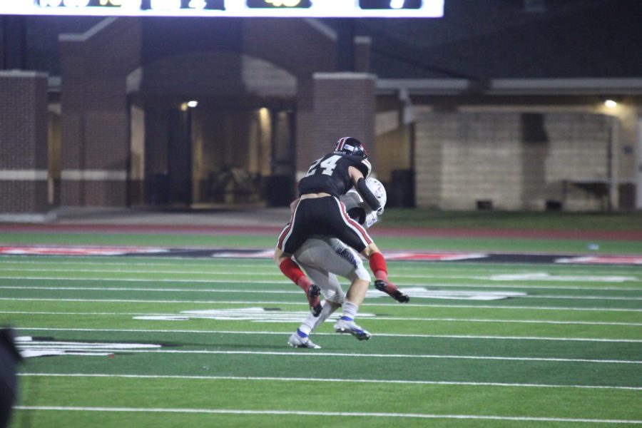 Senior defensive back no. 24 Trent Rucker tackles a Frisco wide receiver. The team is currently 8-0 in the overall season. 
