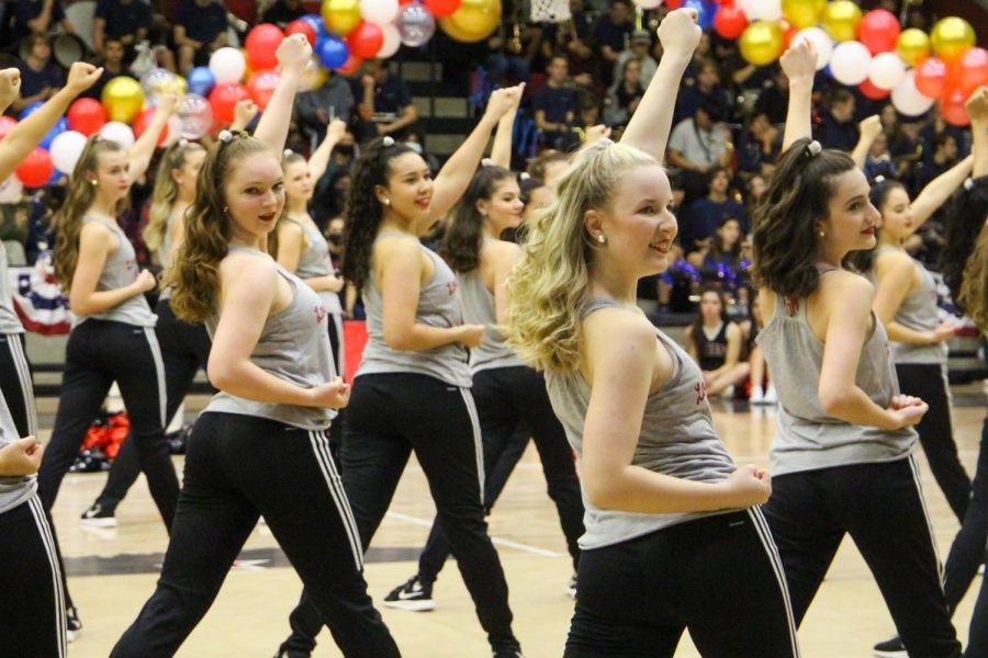 The Majestics dance in the pep rally. Senior Captain Mackenzie Aubel dances in the front. 