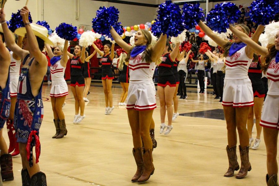 Senior Chaney Roberts cheers during the pep rally. Roberts is the co-captain for the cheer team.
