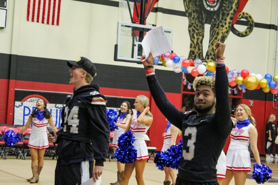 Seniors Trent Rucker and Noah Naidoo hype the crowd up. Rucker and Naidoo were the announcers for the pep rally. 