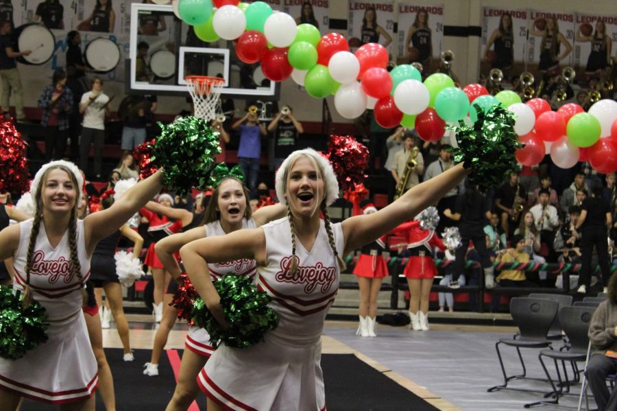 Senior Olivia Laurence cheers to the fight song. The fight song is played at every pep rally.
