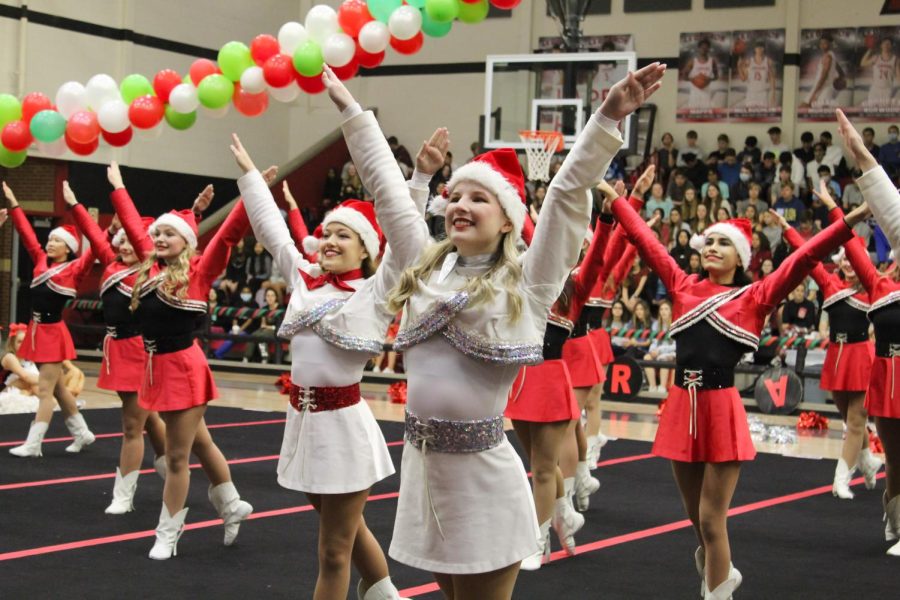Senior Majestics captain Makenzie Aubel performs to a Christmas tune. The Majestics performed the same routine at the last football game.