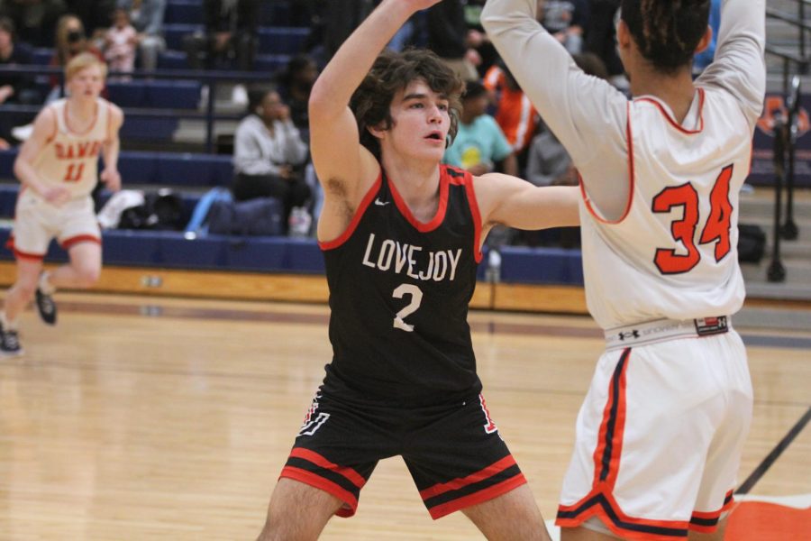 Senior shooting guard no. 2 Jax Thompson blocks. The boys basketball team won their game on Friday, bringing their total victories to 21 with a win percentage of 91%. Their next game is tomorrow at home against the Denton Yellow Jackets. 