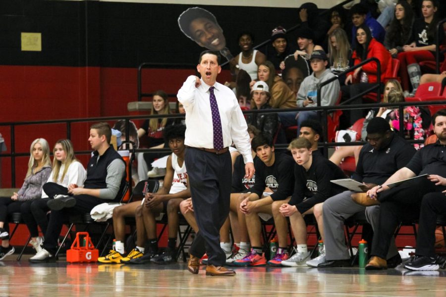 Head basketball coach Kyle Herrema calls a play. The Leopards current season record is 29-3.