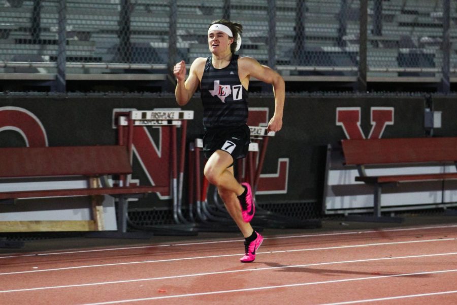 Senior runner Riley McGowan runs in the 400 meter race. McGowan won the race with a time of 50.92 seconds.