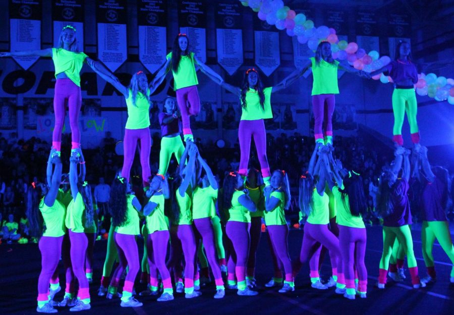 The cheer team performed a throwback performance. Blacklight was the final pep rally of the year.