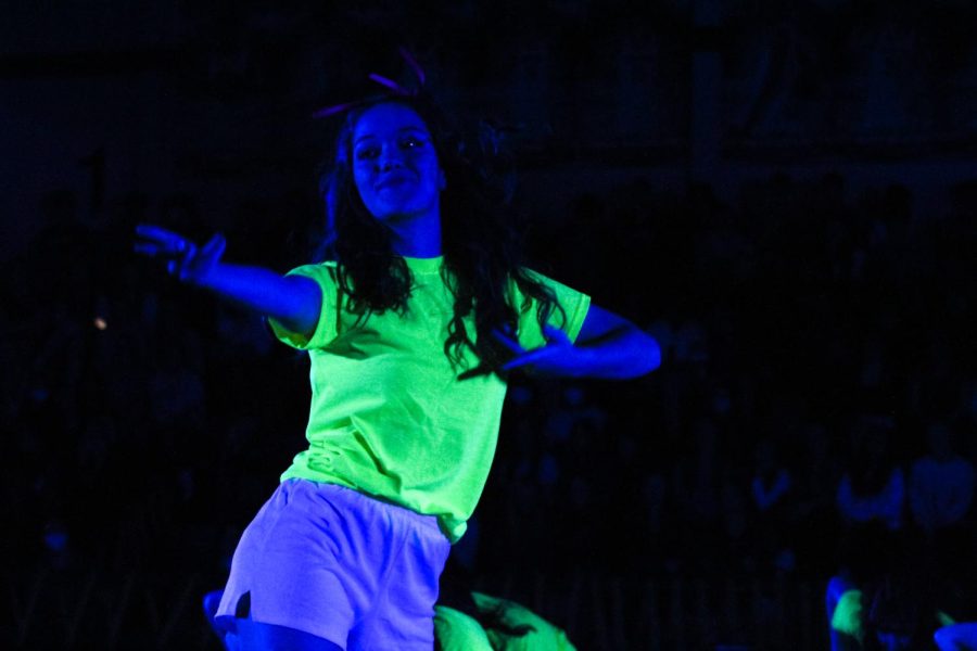 Senior Majestics lieutenant Gina Peoples performs in the pep rally. The Majestics performed their hip-hop competition routine for the black light pep rally.