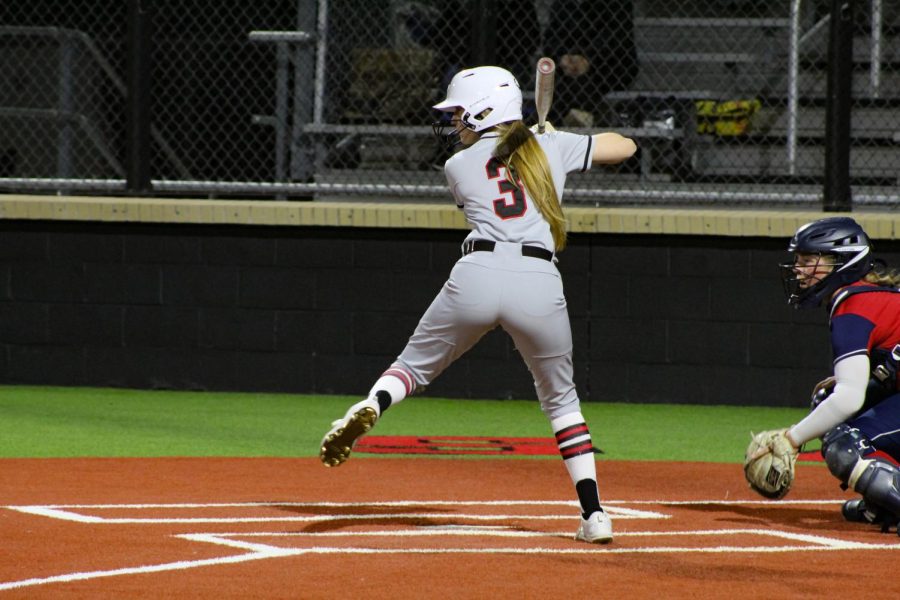 Junior catcher no. 3 Sydney Bardwell attempts to hit the ball. The Leopards next home game is on March 11. 