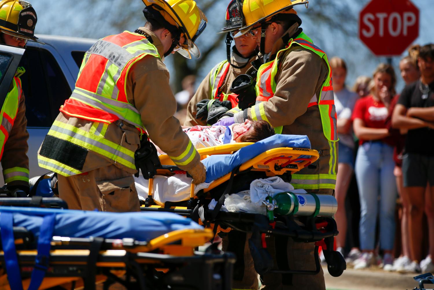 Senior Aidan Abramson gets carried out by paramedics. Abramson was one of the students who passed away in the accident.
