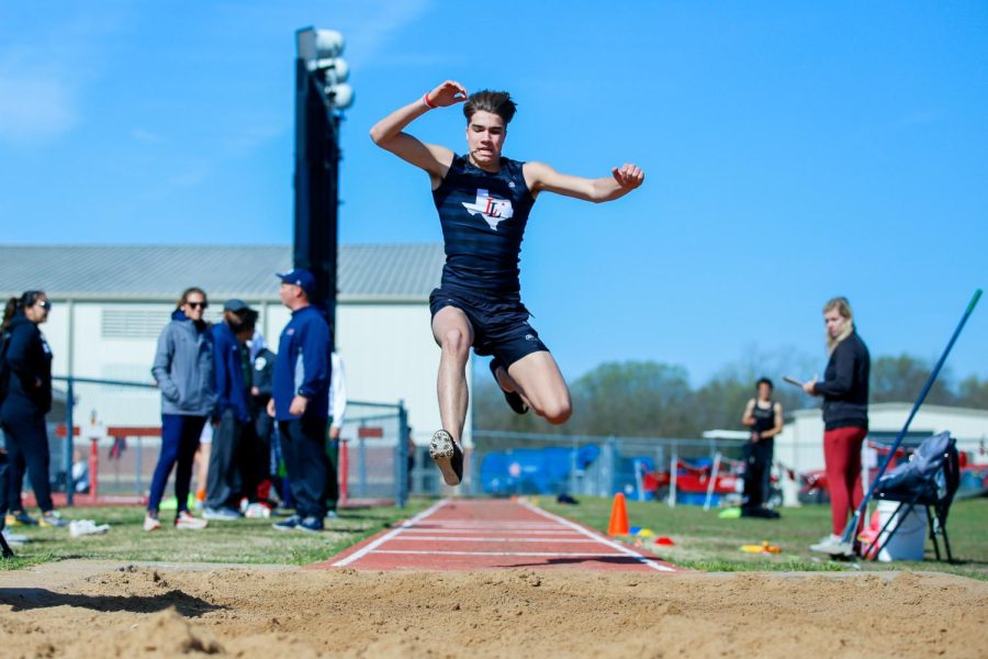 Sophomore Sawyer Black does the triple jump. Black placed sixth in junior varsity. 