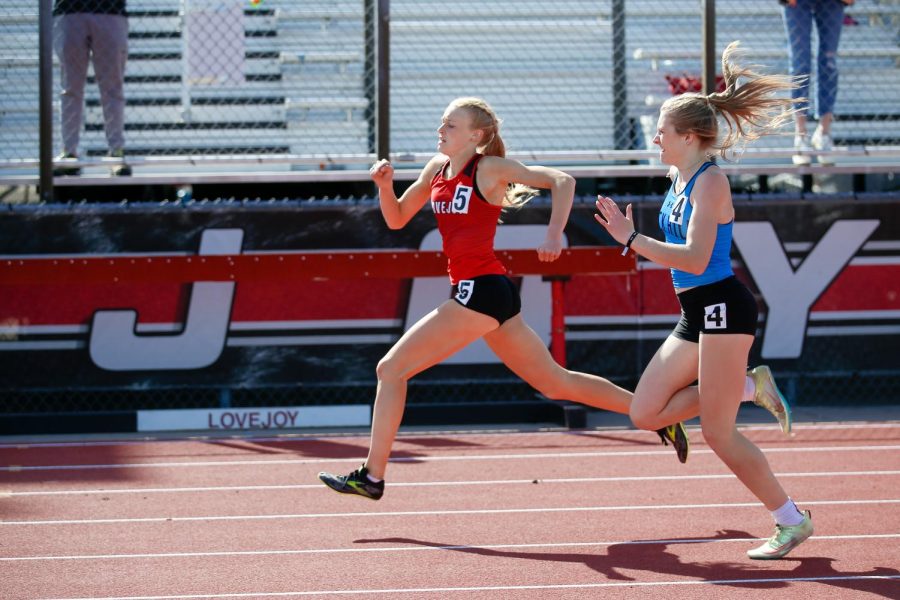 Sophomore Kailey Littlefield runs in the 200 meter dash. Littlefield ran the race in 26.13 seconds.