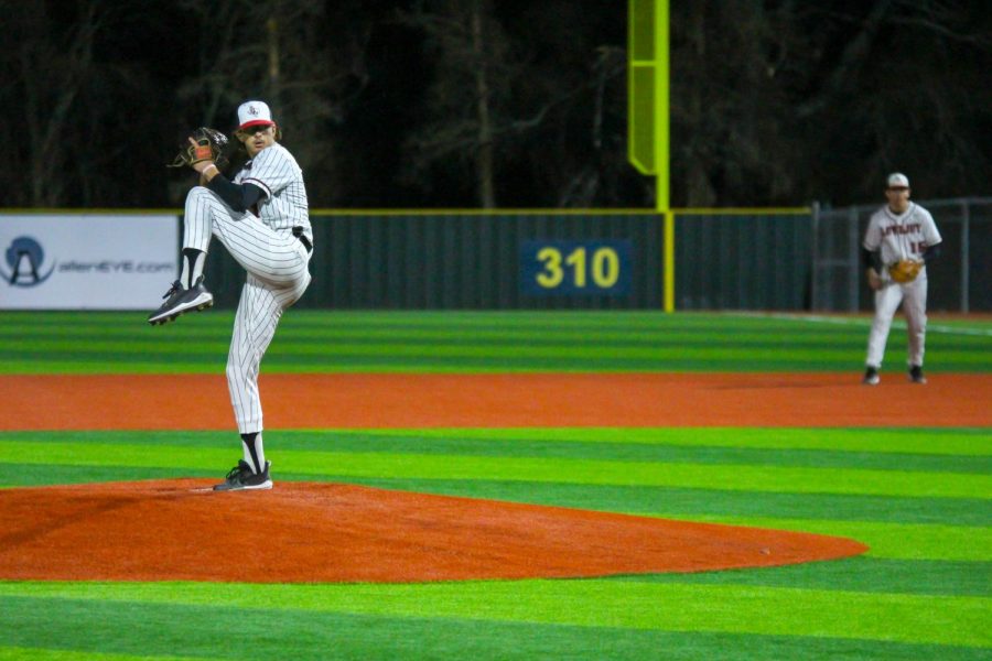 Senior pitcher Jack Livingstone throws the ball in a home game. Livingstone recently committed to play for Texas Tech University.
