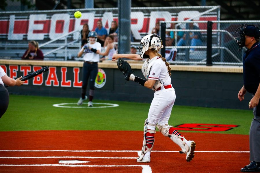 Junior catcher no. 3 Sydney Bardwell throws the ball to first base. Bardwell is committed to play softball for the University of Texas at San Antonio. 