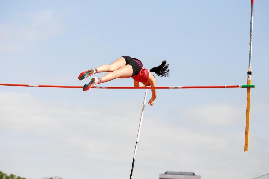 Junior Sarah Salsgiver competes in pole vault. Salsgiver vaulted a height of 106.