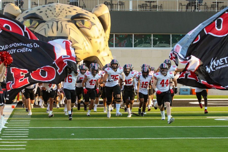 The Leopards break through the banner to take on 6A North Crowley. Lovejoy lost 28-20