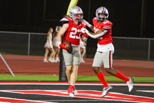 Sophomore outside linebacker no. 23 Owen Magee celebrates his fumble recovery with Senior Roddy Mapps. The Leopards forced two fumbles.