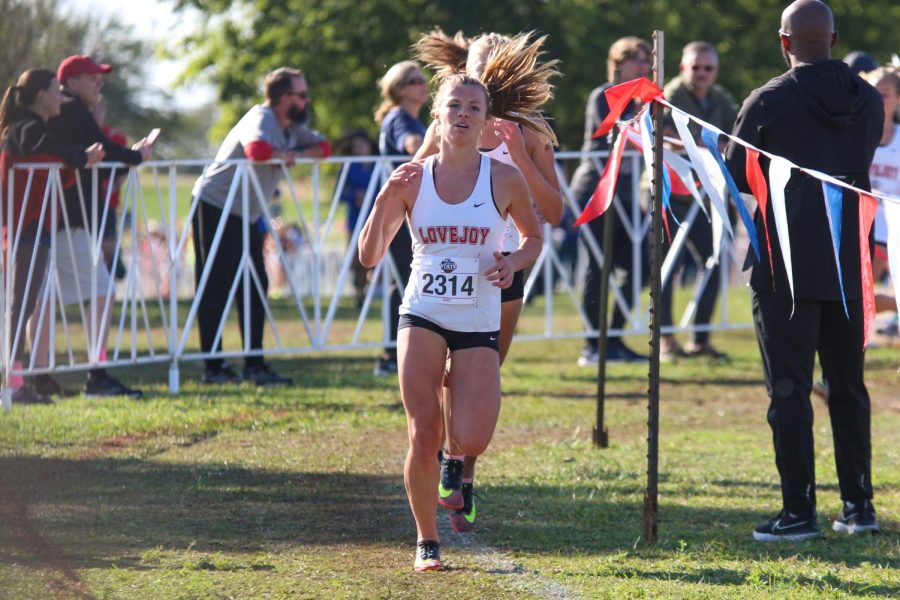 Senior Amy Morefield runs the last mile of the race. Morefield is the only senior on the varsity team.  