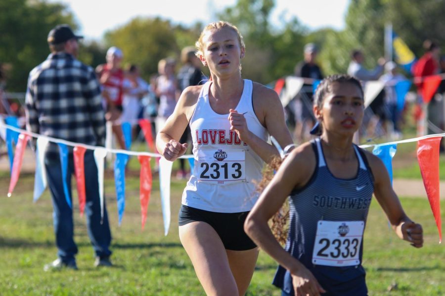 Junior Kailey Littlefield runs a 5k for the state cross country meet. The meet was held in Round Rock, Tx.