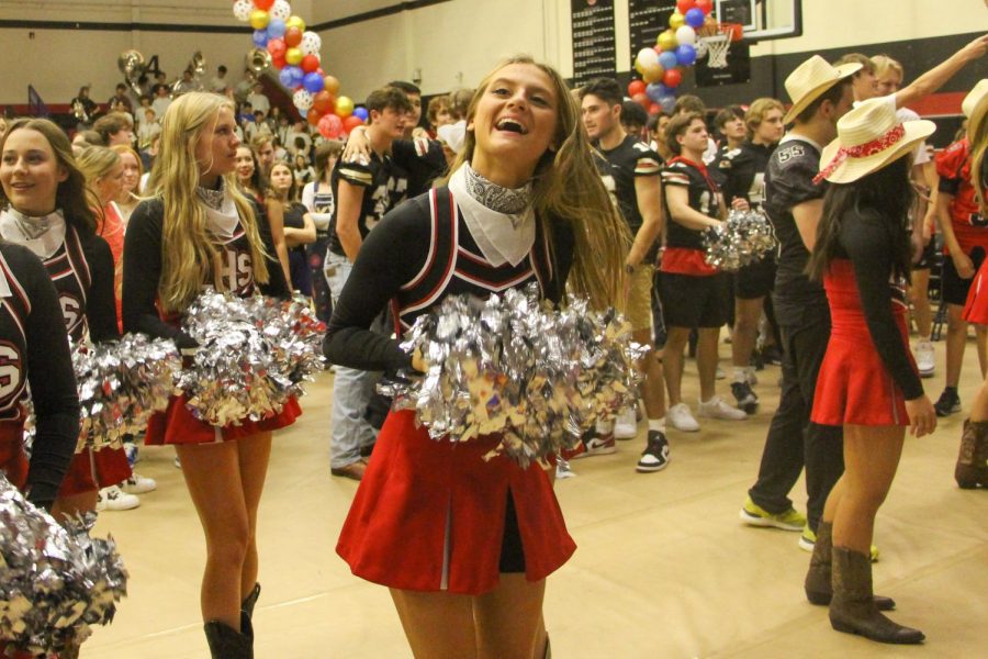 Junior cheerleader Alexis Lambert cheers for the battle cry. The seniors won the spirit competition. 
