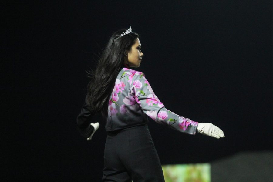 Senior Aliyah Book directs the band at Thursday's football game. Book is also involved in dance outside of school. 