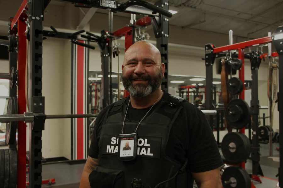 Officer+Chris+Smith+is+a+school+marshal+and+powerlifting+coach.+TRLs+Calla+Patino+tells+us+about+a+day+in+his+life.