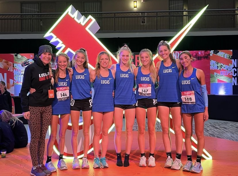 The girls cross country team poses for a picture before their meet. The team competed in the national meet in Portland, Oregon on Saturday.