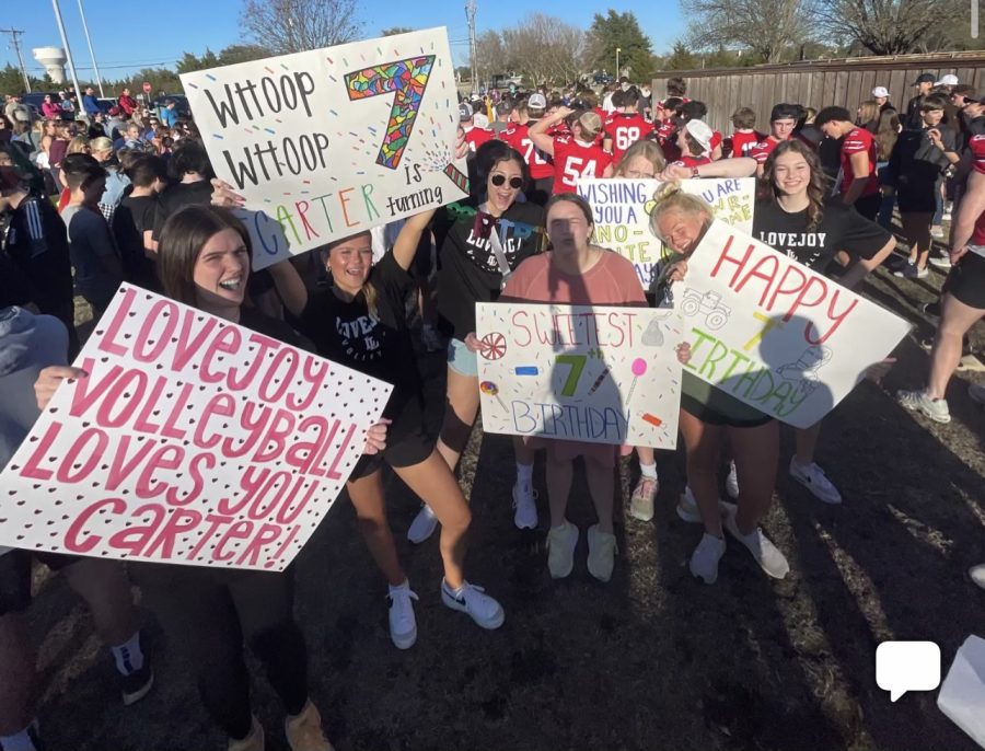 Volleyball members made signs to celebrate Carter. The high school athletics, cheer, majestics and fine arts were also seen marching down Stacy Ridge to the Dubois’ home. 