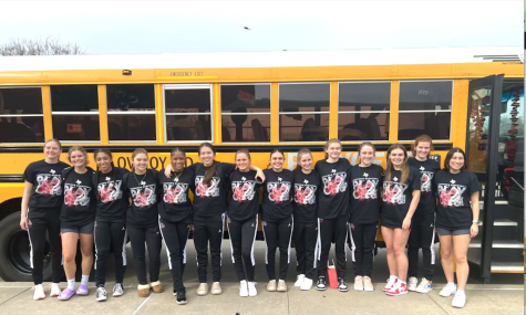 The girls basketball team poses for a picture before heading to their round one matchup against Red Oak. The team ended their season with a 17-17 record.