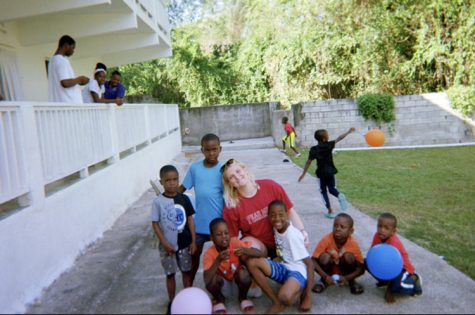 Senior Trista Tippin gets together with the boys from Noahs Ark Childrens Home. Tippin donated goods to the orphanage as her senior project.