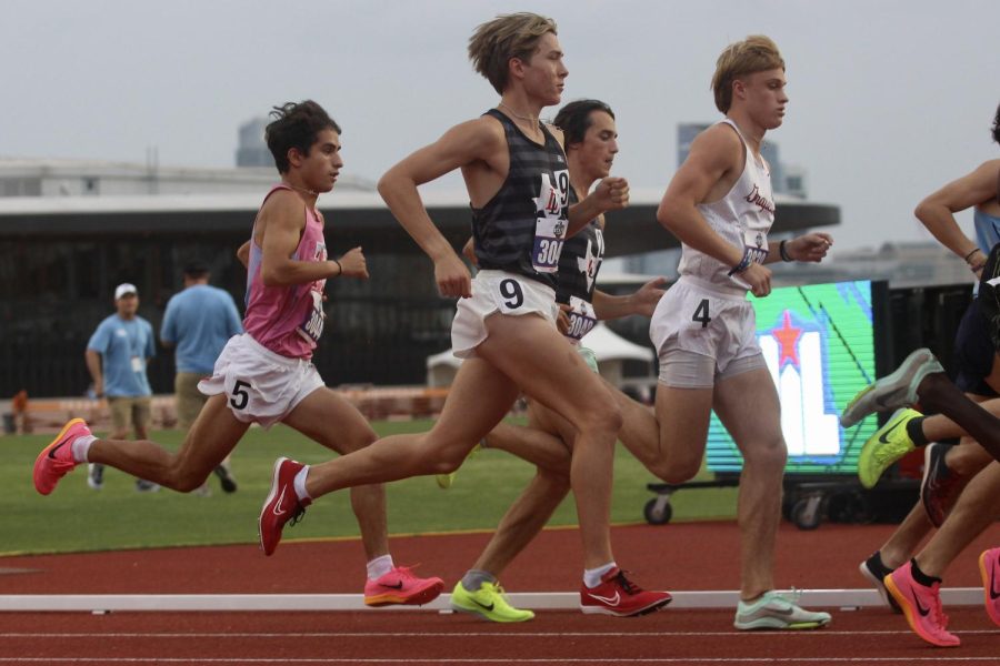 Sophomore Caden Gary runs the 1600 meter race. Gary placed fourth with a time of 4:19.94