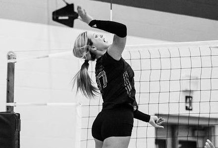 Freshman no. 17 Gentry Barker jumps for a spike. Barker has 101 kills so far this year.