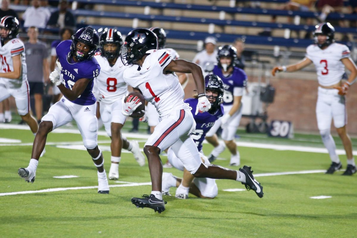 Sophomore kick returner no. 1 Jalen Lott returns a kick. The team will play Argyle next Friday.