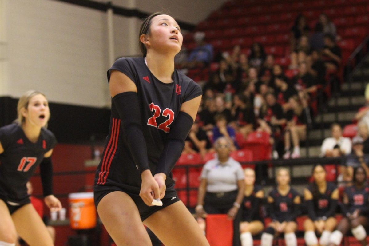 Senior no. 22 Bethanie Wu looks to bump the ball. The team will play Melissa at home on Tuesday.