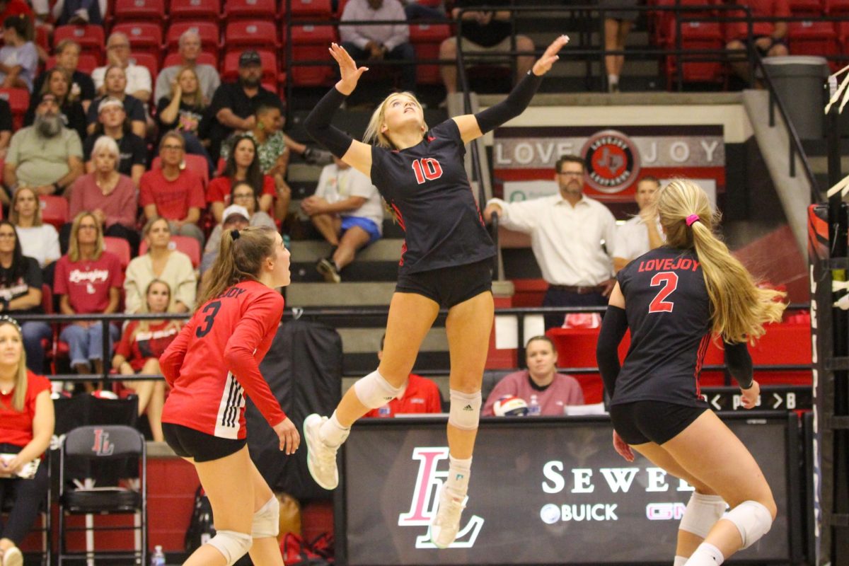 Sophomore no. 10 Skylar Jackson jumps up to spike the ball. The team won the first three sets of the game.