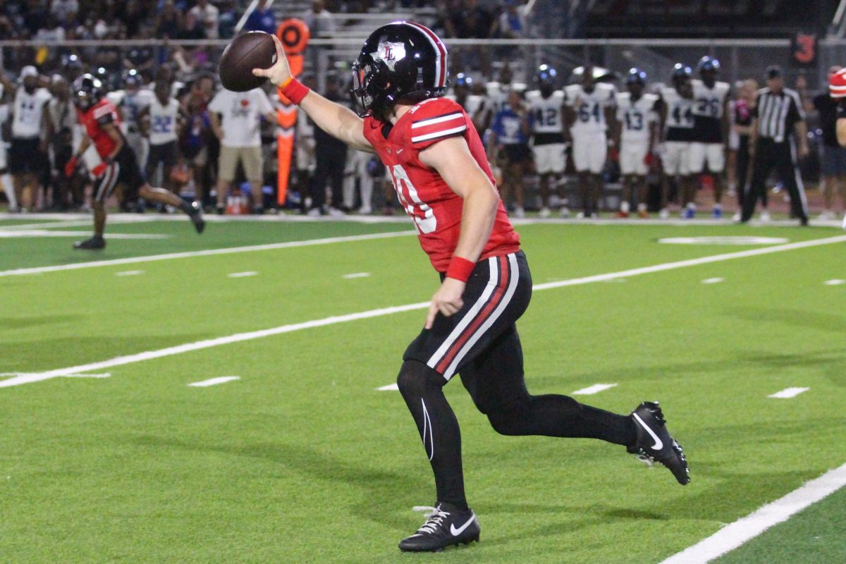 Senior quarterback no. 10 Alexander Franklin runs the ball. Franklin averaged 6.81 yards per pass.
