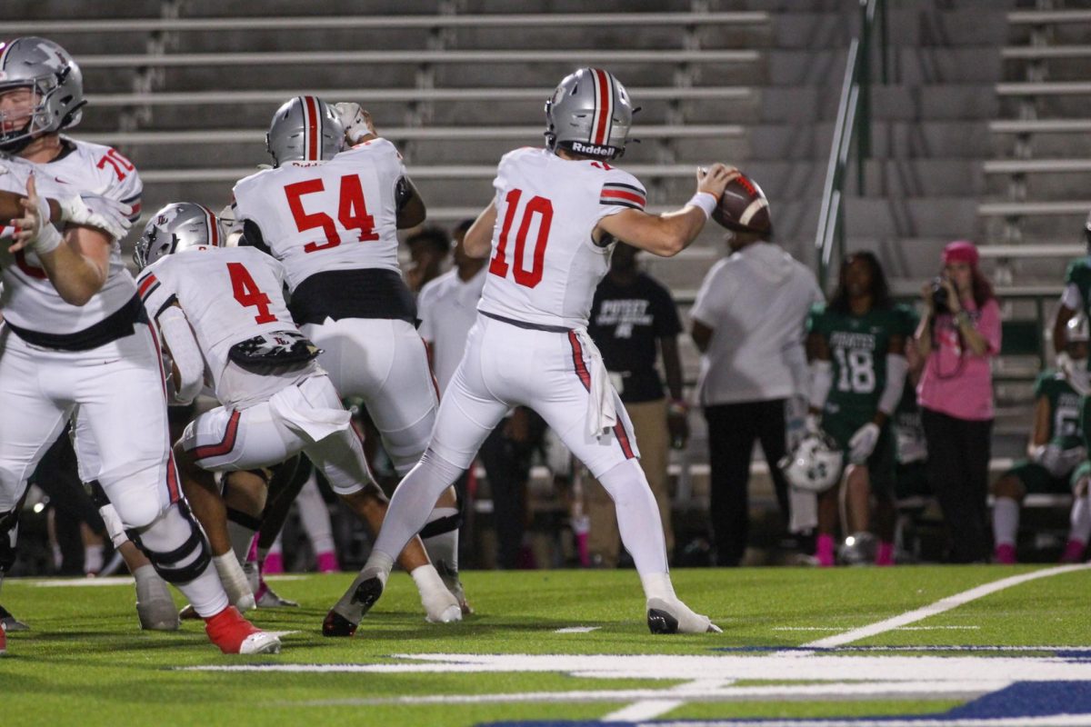 Senior quarterback no. 10 Alexander Franklin looks to throw the ball. Franklin had 19 completed passes during the game. 