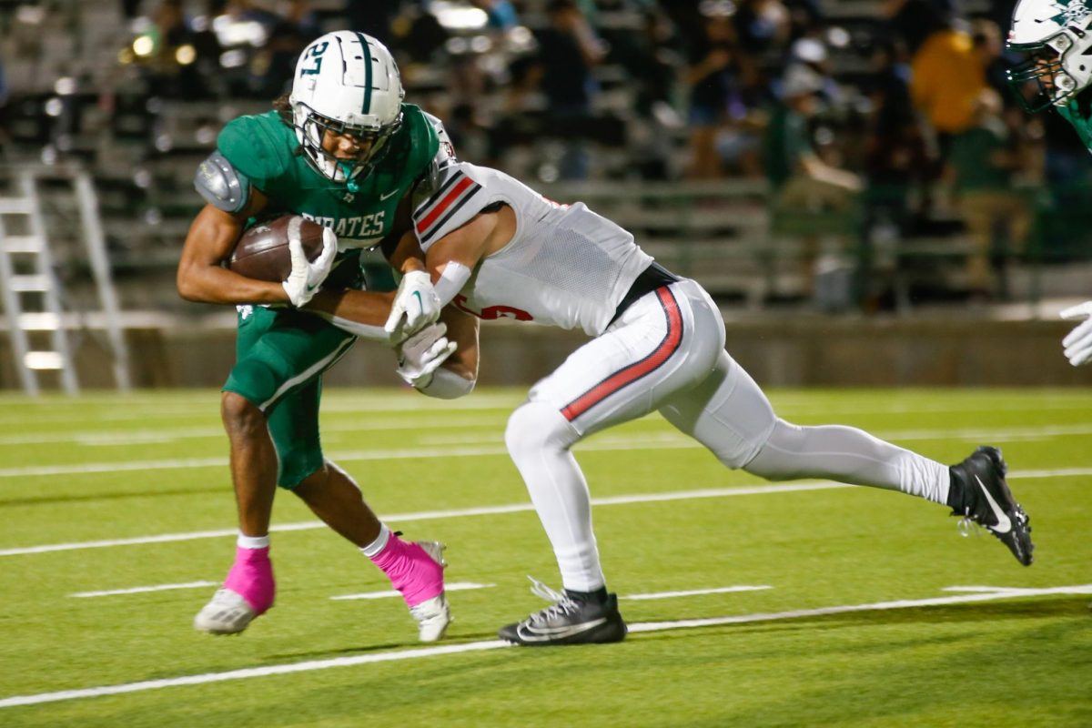 Senior linebacker no. 6 Chase Bogle tackles a Poteet receiver. Lovejoy plays at home against Greenville next Friday.
