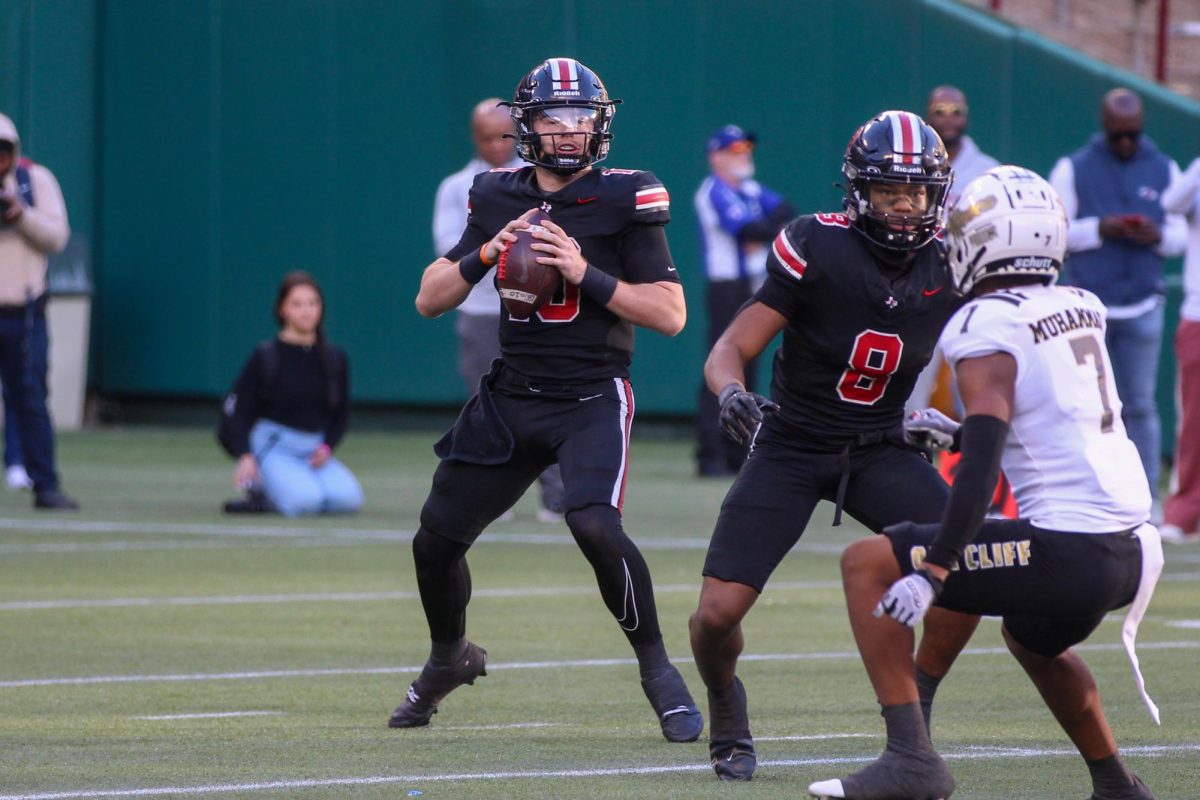 Senior quarterback no. 10 Alexander Franklin looks for a pass. Franklin had 12 completed passes in the game.
