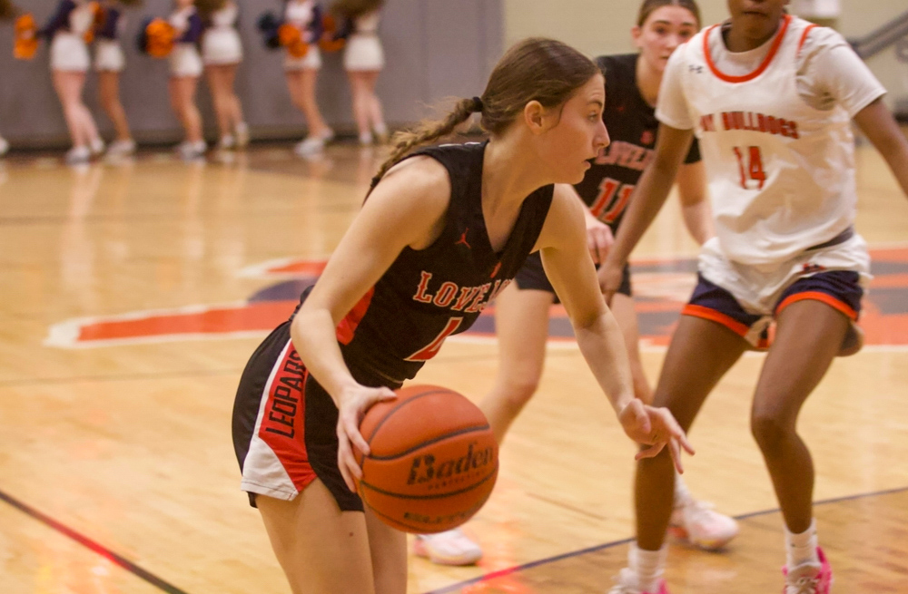Senior no. 4 Lauren Dolberry drives the the basket. Dolberry is also on the track team.