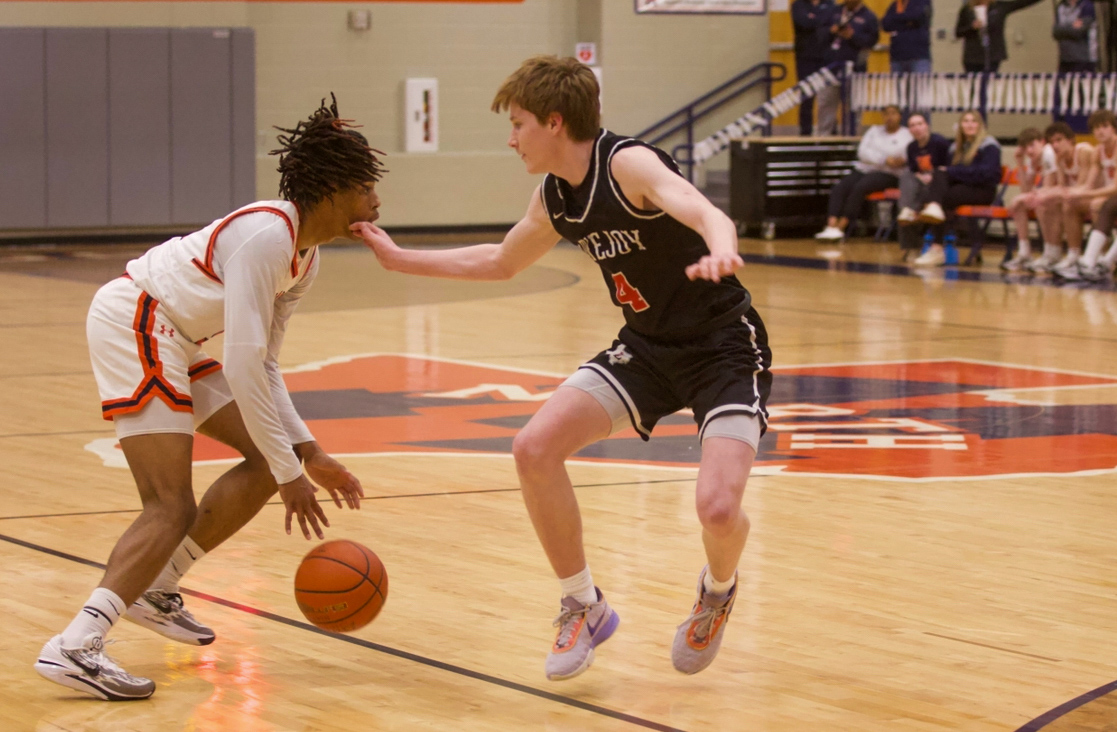 Senior no. 4 Mark Massey defends a McKinney North player. The team is coached by Head Coach Kyle Herrema