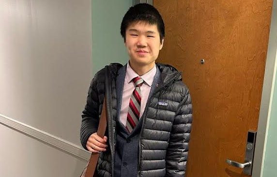 Junior Andy Choy competes at Harvard debate tournament. 
