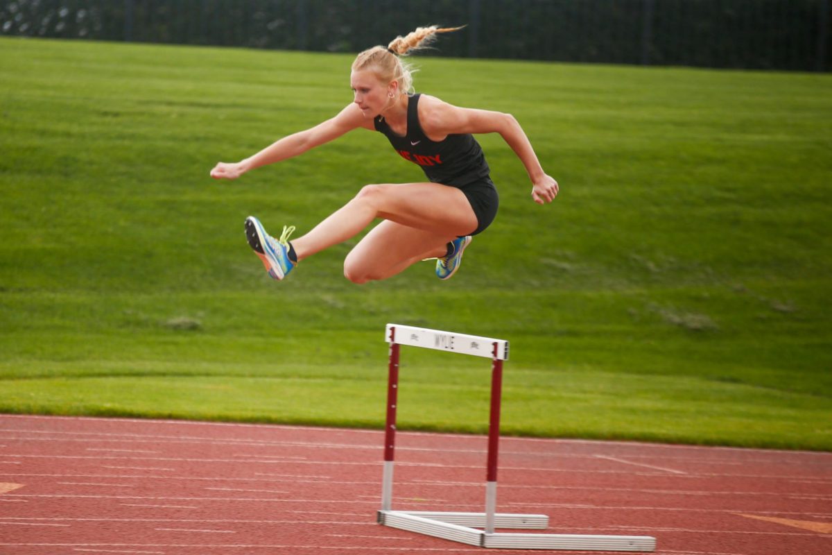 Senior Kailey Littlefield runs the 300m hurdles. Littlefield won with a time of 45.83.