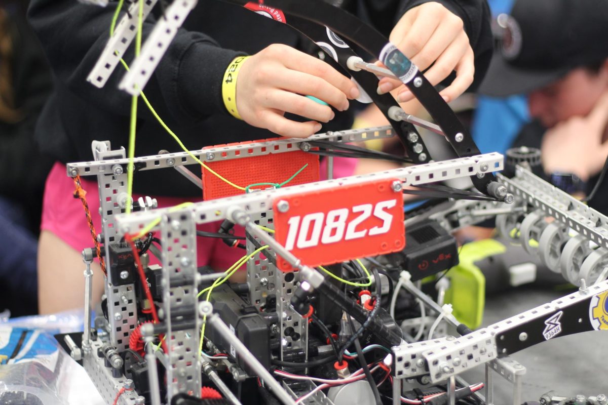 1082Ss robot on the table being adjusted before their next match.