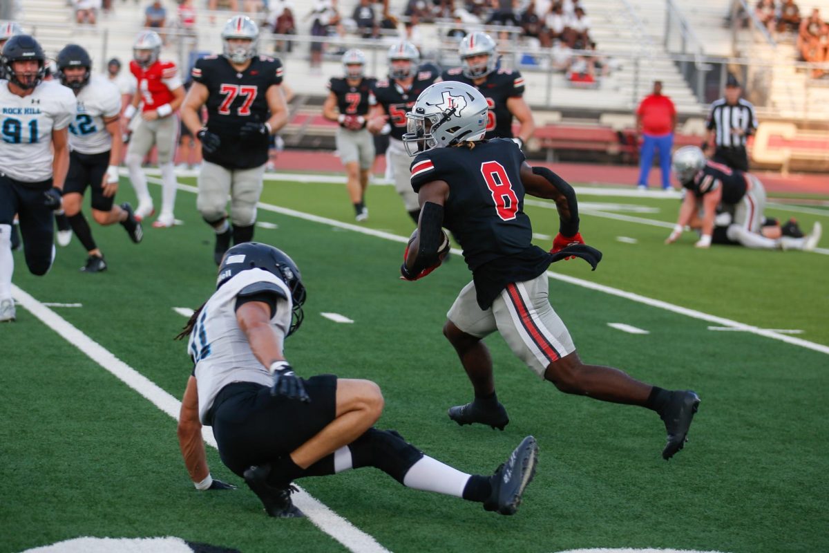 Senior wide receiver no. 8 Jaymez Beaner runs the ball. Lovejoy plays again on Friday.